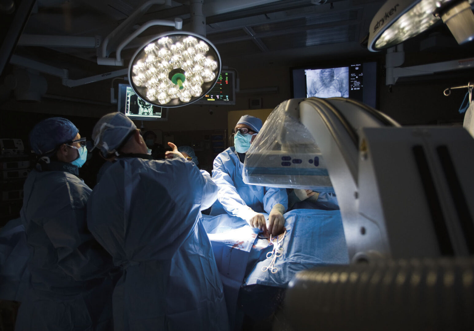 Vascular surgeons perform an abdominal aortic aneurysm repair procedure in the hybrid Cardiovascular Operating Room, located at the David Grant USAF Medical Center on Travis Air Force Base, Calif. U.S. Air Force photo/Tech. Sgt. Bennie J. Davis III)